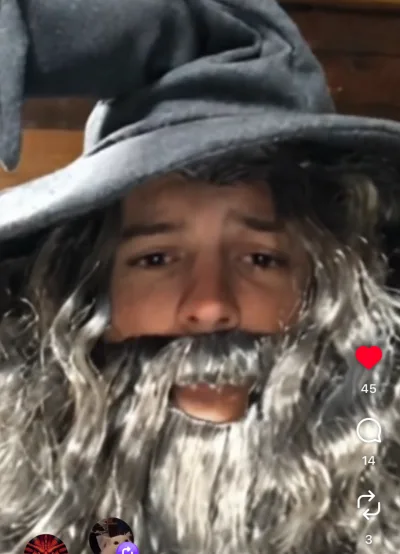 Charley wearing a wizard hat